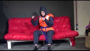 *** HOT HOT HOT*** NEW MODELL*** DESTINY wearing a sexy red/darkblue shiny nylon rain suit ties and gagges herself with cuffs and a cloth gag (Video)