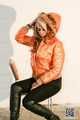 Lady Lana - special orange Adidas Downjacket with fur hood