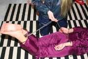 Watching sexy Alina being tied and gagged on the floor from Katharina both wearing sexy shiny nylon rainwear combinations (Pics)