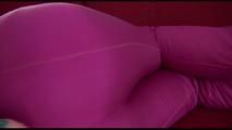 Jill tied and gagged on a red sofa wearing an oldschool shiny nylon downwear skibib (Video) 