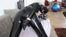 Rubber doll plays with herself