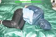 Get 548 Pictures with Jill tied and gagged in shiny nylon rainwear from 2005-2008!