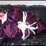 Lucy tied, gagged and hooded on the sofa wearing a sexy purple shiny nylon downwear combination (Video)