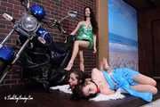 Lucky, Nelly, Xenia - Lucky poses on motorbike, two girls hogtied