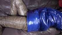 *** Watching sexy SONJA during changing her clothes into a sexy brown shiny nylon down pants and a sexy blue shiny nylon down jacket lolling on the bed (video)***