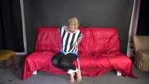 PiA being tied and gagged on a sofa with ropes and a clothgag wearing a sexy lightblue shiny nylon shorts and a white/black striped top (Video)