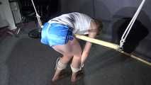 Watching sexy Sonja wearing a sexy blue shorts and a white top being tied and gagged overhead (Video)