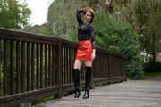 Miss Petra in hot vinyl skirt and overknee boots at the photo shoot