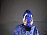 Watch Sandra beeing bound, pantygagged and finally pantyhooded in her shiny nylon Rainwear