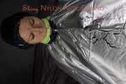 Ronja being tied and gagged on a chair wearing sexy shiny nylon rainwear and a rain coat (Pics)