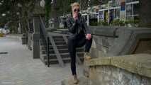 Short cut hair blonde girl is smoking two cork cigarettes