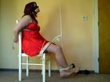 Lady in Red on a chair 2/2