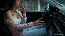 Meet Anastasia in her car while she is smoking two 120mm all white cigarettes