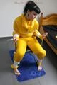 Jill tied and gagged on a chair wearing a yellow rainsuit and coveres with an yellow raincoat with two hoods (Pics)