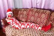 Bekki - Mummified for Christmas in red and white tape