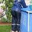 Watch Chloe cleaning the Pool in her shiny nylon Rainwear