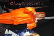 Watching sexy Sandra and Stella putting on several hot shiny nylon rainwear (Pics)