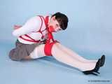 Rozanka - Leggy brunette rocks a schoolgirl uniform during her bondage shoot