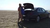 At the nudist beach by car