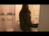 Alina dressing her up in the bathroom and lolling in bed wearing sexy adidas shiny nylon shorts and rain jacket (Video)