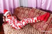 Bekki - Mummified for Christmas in red and white tape