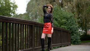 Miss Petra in hot vinyl skirt and overknee boots at the photo shoot