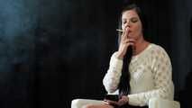 Watch lovely Tanya lighting up and smoking a 120mm Cigaronne