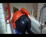 SEXY SANDRA wearing an special orange down jacket and a black down pants during taking a bath playing with water and the downwear (Video)