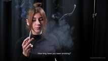 Alina is giving an interview while smoking 100mm cigarette at the smoking studio