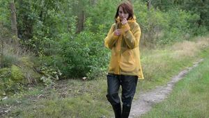 Miss Petra takes a walk in Hunter rain jacket, rain pants and rubber boots (very exclusive set with expensive rain gear and looped video)