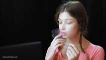 Watch the beauty with crystal blue eyes smoking a 120mm cigarette in her fresh video