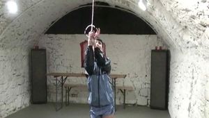Jill tied and gagged in the cellar wearing a shiny light blue nylon shorts (Video)