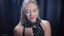 Blonde is smoking in a black leather gloves