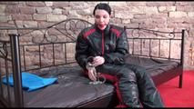 Jill ties and gagges herself sitting on a princess bed in an old cellar wearing sexy black shiny nylon down wear (Video)