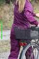 Watch Sandra riding her bike enjoying her shiny nylon Rainwear