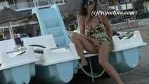 016220 Eve Pees On The Pedalo