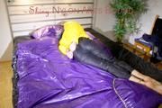 Pia wearing a sexy black rain pants and a yellow down jacket tied on bed with cuffs and gagged with a cloth (Pics)