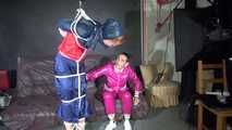 SEXY RONJA being tied and gagged and hooded from Sexy Stella both wearing sexy shiny nylon rainwear (Video) 