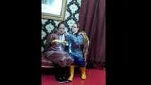 Lady Nadja and Miss Scarlett in  AGU rainwear covered with transparent raingear (video)