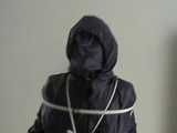 5 short Videos with Katharina tied and gagged in shiny nylon rainwear from 2005-2008