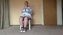 Sandra chairtied and drooling 1/2