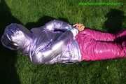 Watch Sandra beeing bound and gagged in her shiny nylon Downwear in the Garden