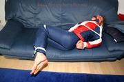 Katharina tied and gagged in a skisuit