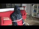 03:20 Min. video with Katharina tied and gagged in a shiny nylon rainsuit