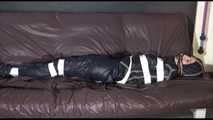 MARA tied, gagged and hoded with tape wearing a supersexy black rain suit (Video)