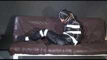 MARA tied, gagged and hoded with tape wearing a supersexy black rain suit (Video)