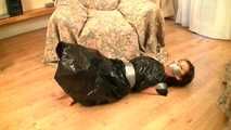 [From archive] Vijaya - captured and hogtaped in her trash bag dress (video)