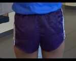 Get 2 Archive Videos with Alina enjoying her shiny nylon Shorts
