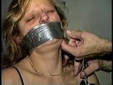 43 YEAR OLD WAITRESS IS TAPE HOG-TIED, BAREFOOT, TOE-TIED & WRAP TAPE GAGGED (D65-8)
