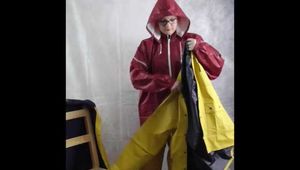 Lady Nadja tape bound in layers of nylon raingear and a transparent coat